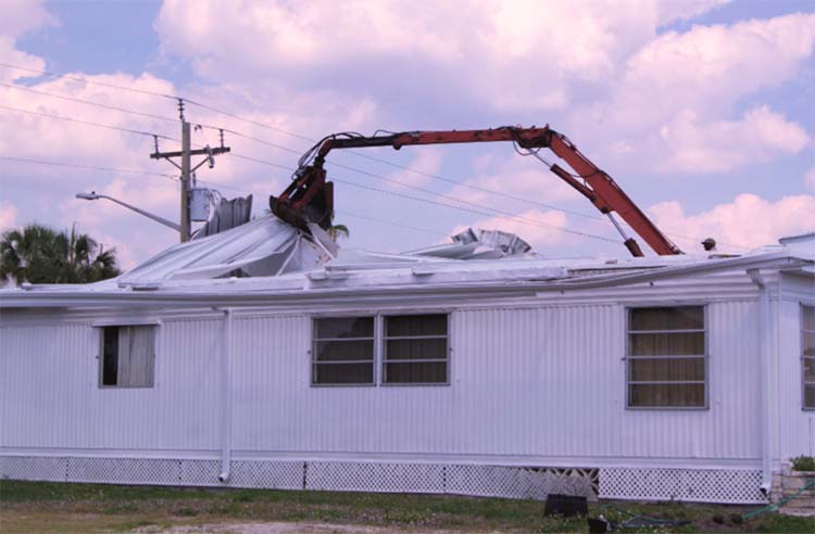 Mobile home being demolished